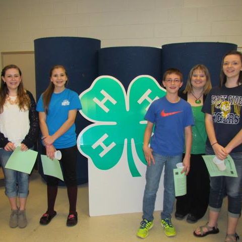 4-H Judging Team posing in front of 4-H Clover 